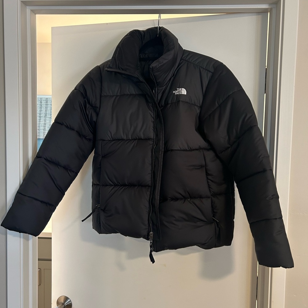 Northface face black woman puffer jacket, never worn